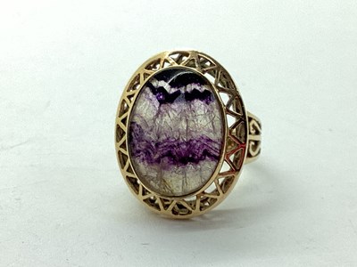Lot 80 - A Blue John Single Stone Ring, oval collet...