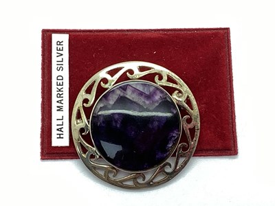 Lot 151 - A Blue John Circular Brooch, collet set within...