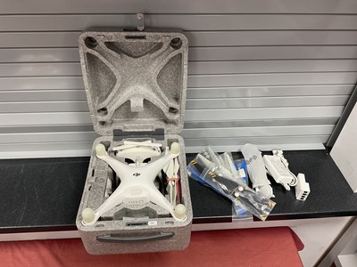 Lot 651 - A DJI Phantom Drone, within original storage...