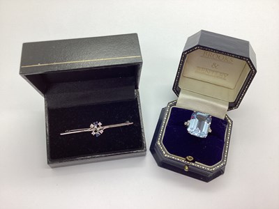 Lot 110 - A Modern Sapphire Inset Bar Brooch, claw set,...