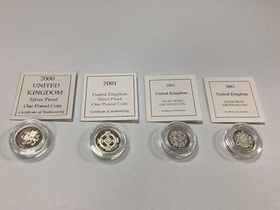 Lot 551 - Four Royal Mint Silver Proof £1 Coins, 2000 -...