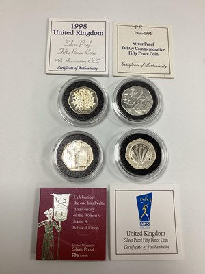 Lot 546 - Four Royal Mint Silver Proof 50p Coins,...