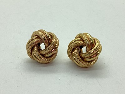 Lot 74 - A Pair of Textured Knot Style Stud Earrings,...