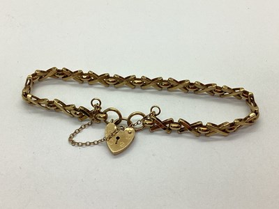 Lot 86 - A Fancy Link Bracelet, the alternating 'X'...