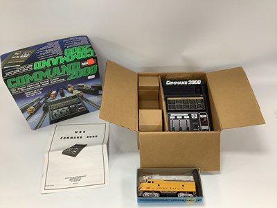 Lot 179 - A boxed MRC Command 2000 console with Athearn...