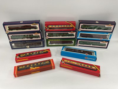 Lot 150 - Thirteen boxed OO gauge coaches by Bachmann,...