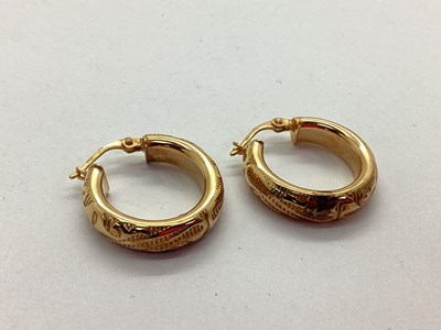 Lot 80 - A Pair of 9ct Gold Creole Earrings, textured...