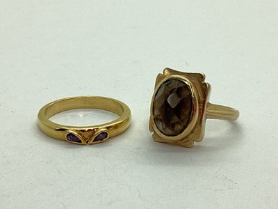 Lot 69 - A 9ct Gold Dress Ring, oval faceted collet set...