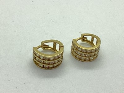 Lot 79 - A Pair of Huggie Style Earrings, semi inset...