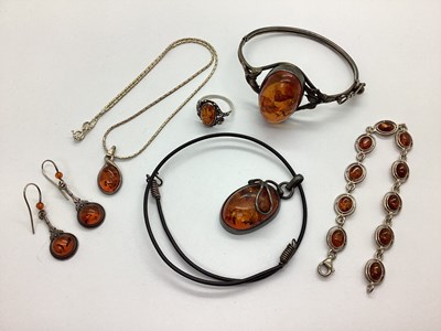 Lot 98 - A Collection of Amber Coloured Jewellery, to...