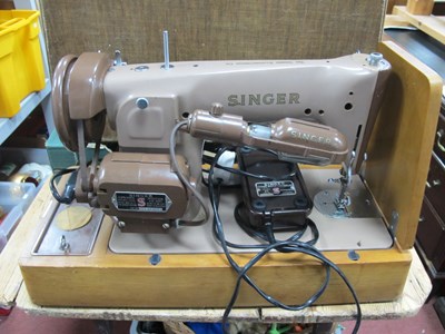 Lot 1196 - A Cased c1959 Singer 281K Electric Sewing...