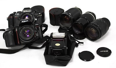 Lot 1457 - Nikon SLR Cameras, lenses and accessories,...