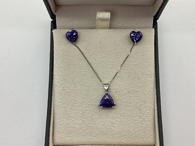 Lot 96 - A Modern Tanzanite Colour Single Stone Pendant,...