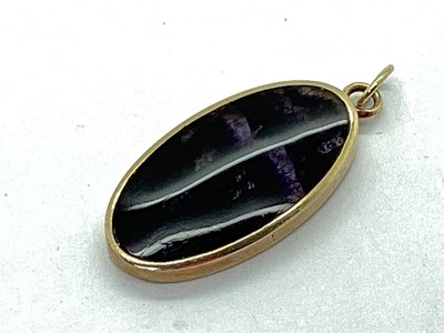 Lot 119 - A 9ct Gold Blue John Oval Pendant, Birmingham...