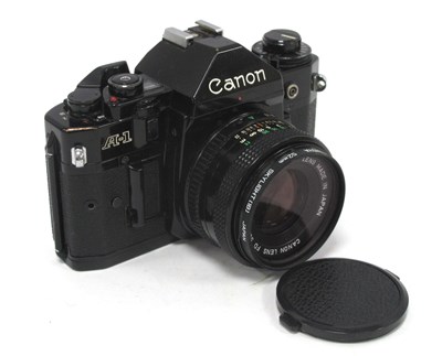 Lot 1386 - Canon A-1 35mm SLR Film Camera #1153608 with...