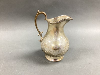Lot 24 - A Victorian Hallmarked Silver Jug, of baluster...