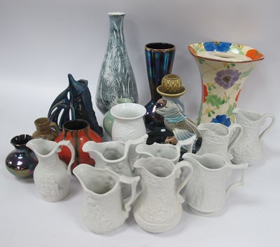 Lot 1288 - Seven Portmeirion Parian Jugs, small lava vase,...