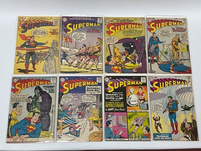 Lot 882 - Eight Golden and Silver Age Superman comics by...