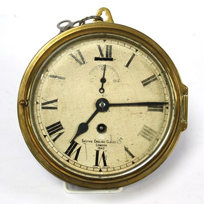 Lot 1412 - A Brass-Cased Smith Ship’s Clock, with key,...