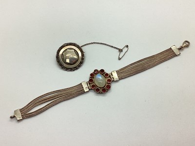 Lot 104 - A Moonstone Inset Multi Row Bracelet, oval...