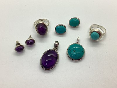 Lot 137 - Modern Cabochon Pendant, Earrings and Matching...