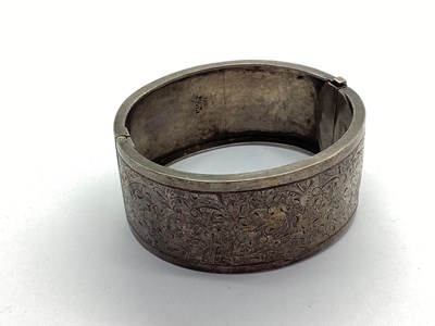 Lot 123 - A Victorian Style Wide Hinged Bangle, allover...