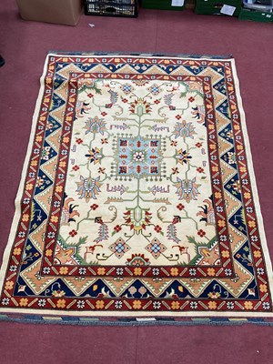 Lot 1670 - Afghan Made Hand Spun Wool Rug, with floral...