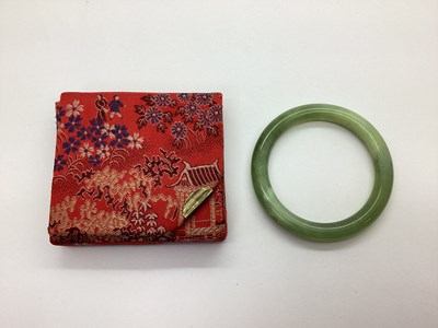 Lot 198 - A Jade Bangle, internal diameter 5.9cm, in a...