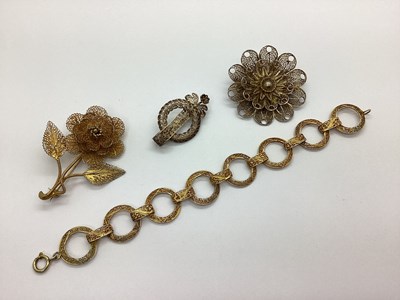 Lot 108 - A Gilt Coloured Circular Link Filigree...