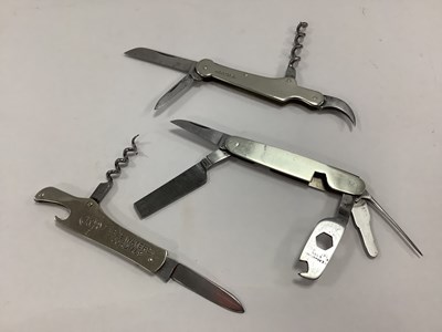 Lot 329 - Three Multi Function Folding Pocket Knives,...