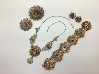 Lot 134 - A Flowerhead Design Filigree Panel Bracelet,...