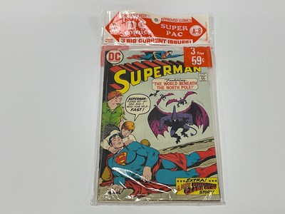 Lot 937 - DC Comics Super Pac #A-8, Three comic...