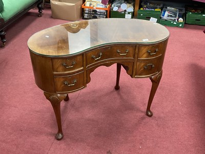 Lot 1667 - XX Century Mahogany Kidney Shaped Dressing...