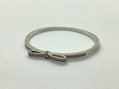 Lot 175 - Pandora; A Small Bow Design Hinged Bangle,...