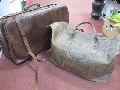 Lot 1304 - An Early XX Century Leather Suitcase, with...