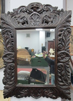 Lot 1399 - Late XIX Century Carved Oak Mirror, top with a...
