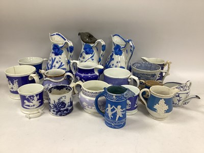 Lot 1143 - Three XIX Century Pottery Blue & White Jugs,...