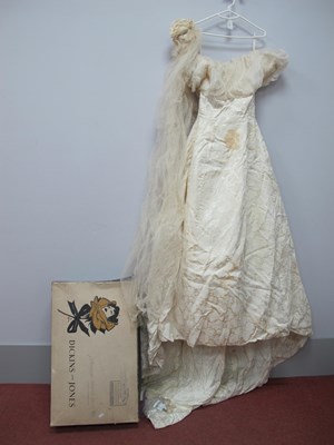 Lot 1284 - A Late 1950's Cream Damask Wedding Gown,...