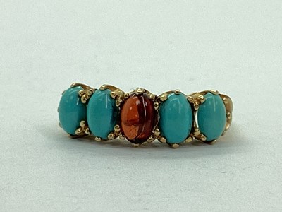 Lot 65 - A 9ct Gold Oval Cabochon Five Stone Ring, claw...