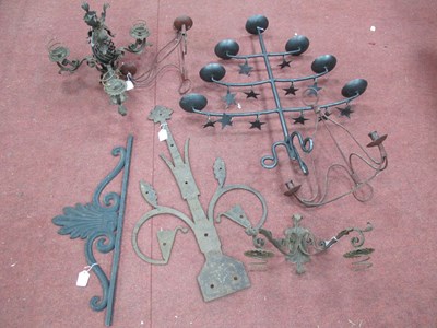 Lot 1217 - Graduated Cast Iron Candelabra, two iron...