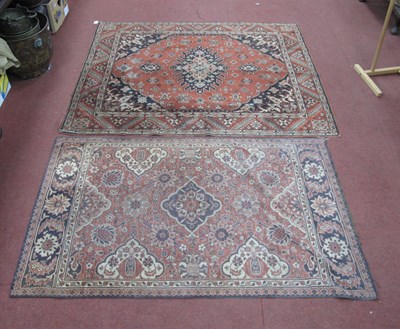 Lot 1461 - Two Middle Eastern Floral Rugs, each on rust...