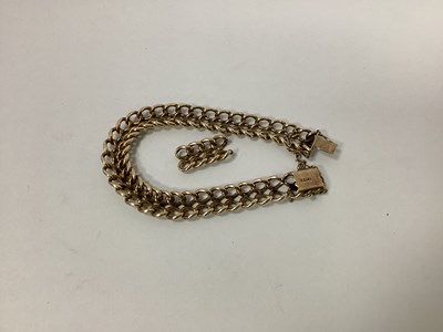 Lot 1362 - A Double Curb Link Bracelet, of uniform design,...