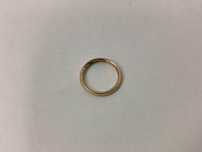 Lot 1355 - An 18ct Gold Plain Wedding Band.