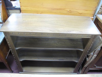 Lot 1619 - Ercol Bookcase with two adjustable shelves, on...