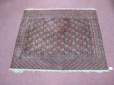 Lot 1494 - A Middle Eastern Rug, the centre with rows of...