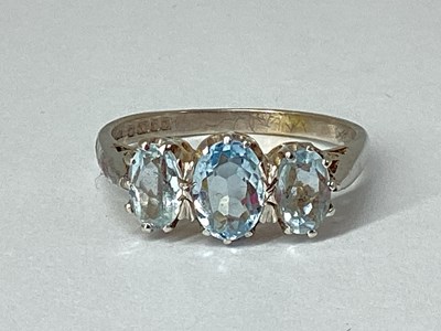 Lot 70 - A 9ct White Gold Aquamarine Three Stone Ring,...