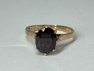 Lot 75 - A 9ct Gold Garnet Single Stone Dress Ring,...