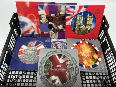Lot 313 - Eight Royal Mint UK Bunc Coin Collections,...