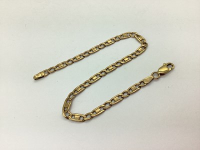 Lot 145 - A Fancy Flat Link Bracelet, stamped "375",...