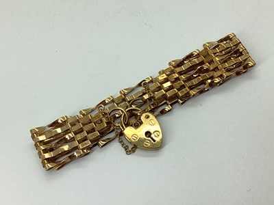 Lot 142 - A 9ct Gold Gate Link Bracelet, to 9ct gold...